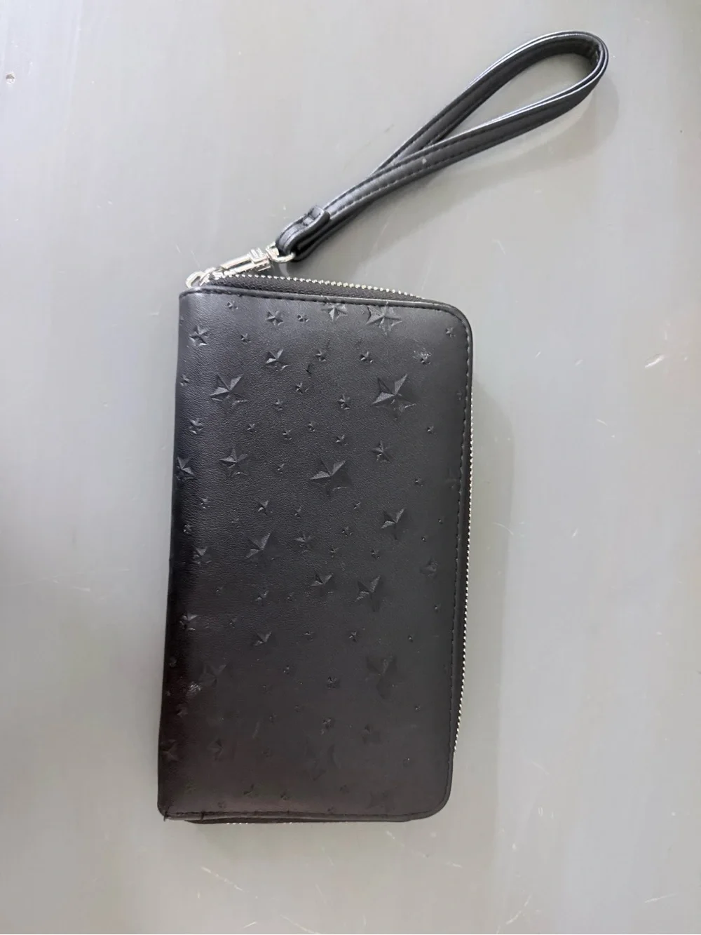 Black Star-Embossed Zip Wallet Wristlet